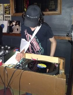 A DJ Spins Vinyl at Sycamore Bar & Flower Shop /© photo by B.L.Howard