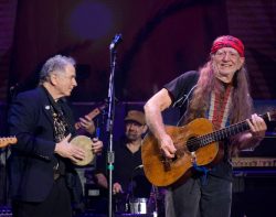 David Amram and Willie Nelson / photo by Ebet Roberts